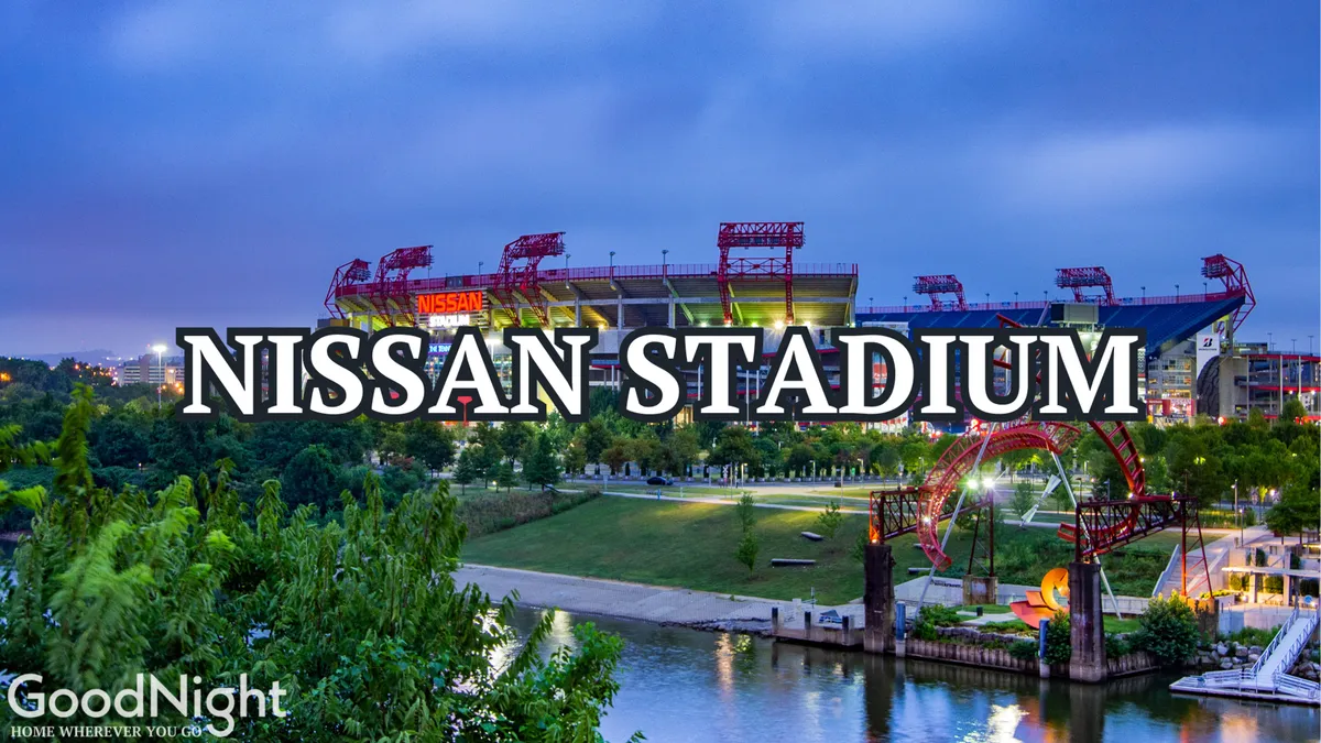 A panoramic exterior view of Nissan Stadium, with surrounding park areas and the nearby river. The stadium is framed by open green spaces, providing a sense of community and excitement. Visitors can be seen walking or jogging, and the scene hints at the wide variety of recreational and sporting events available.